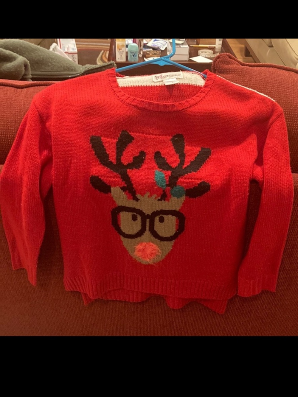 Red Reindeer Holiday Sweater. Cotton Emporium. Candy cane back Size 10/12 Kids M